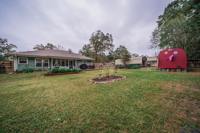 view of yard featuring a storage shed