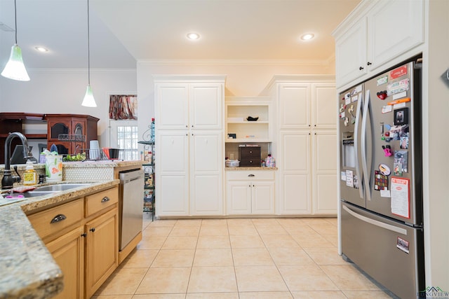 2120 Page Rd, Longview, TX 75601 - kitchen featuring stainless steel appliances, a sink, ornamental molding, light tile patterned flooring, and decorative light fixtures