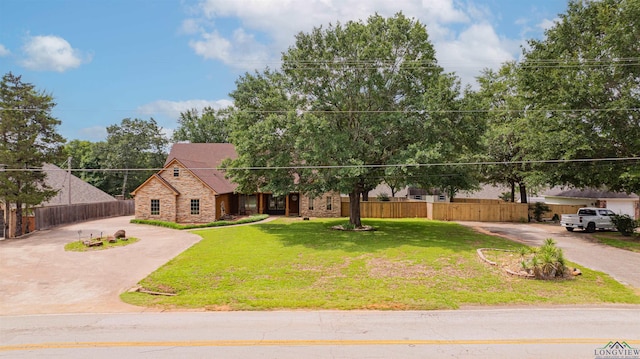 2120 Page Rd, Longview, TX 75601 - view of front of home with stone siding and driveway