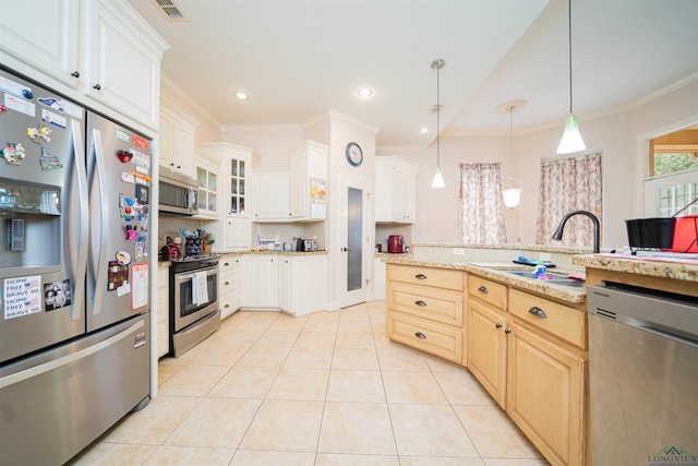 2120 Page Rd, Longview, TX 75601 - kitchen featuring appliances with stainless steel finishes, light tile patterned floors, crown molding, hanging light fixtures, and a sink