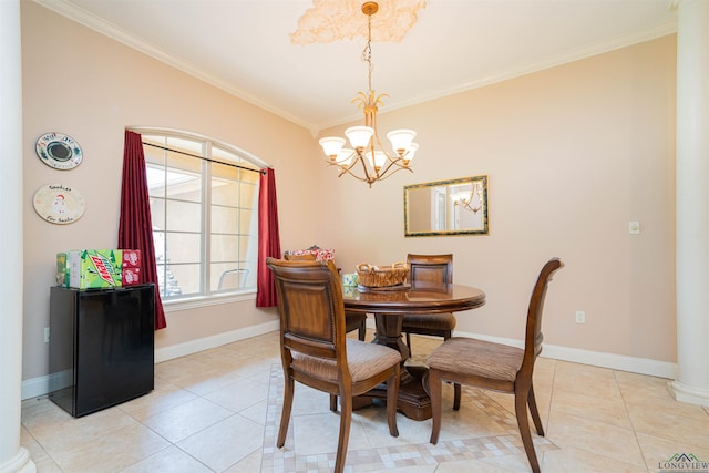 2120 Page Rd, Longview, TX 75601 - dining area with light tile patterned floors, ornamental molding, baseboards, a chandelier, and ornate columns