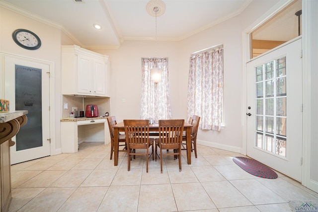 2120 Page Rd, Longview, TX 75601 - dining space with light tile patterned floors, crown molding, baseboards, and recessed lighting