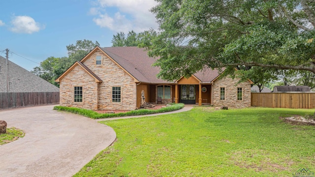 2120 Page Rd, Longview, TX 75601 - view of front facade with stone siding and concrete driveway