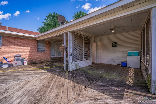 10816 Fm 2685, Gladewater, TX 75647 - deck featuring a ceiling fan and area for grilling