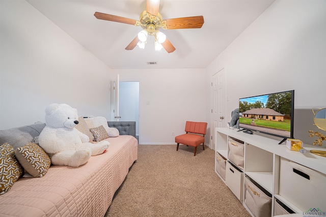 carpeted bedroom featuring ceiling fan