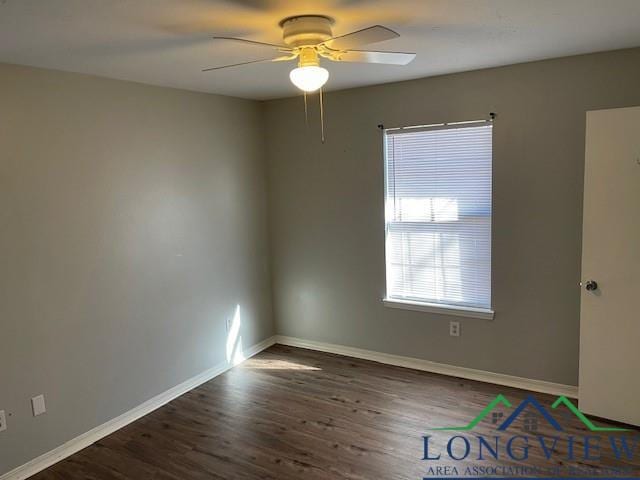 unfurnished room featuring ceiling fan and dark hardwood / wood-style floors