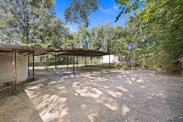 exterior space with a carport