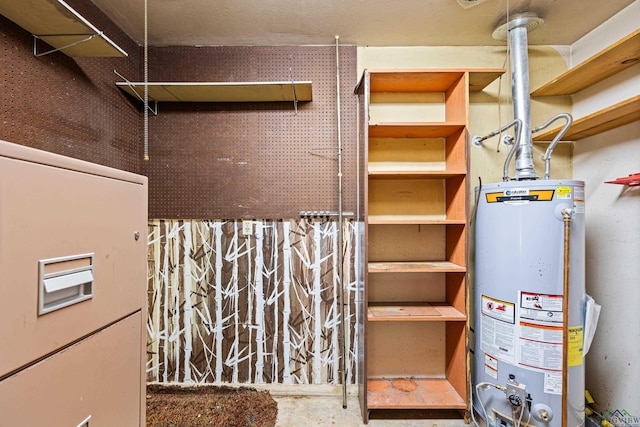 utility room with water heater