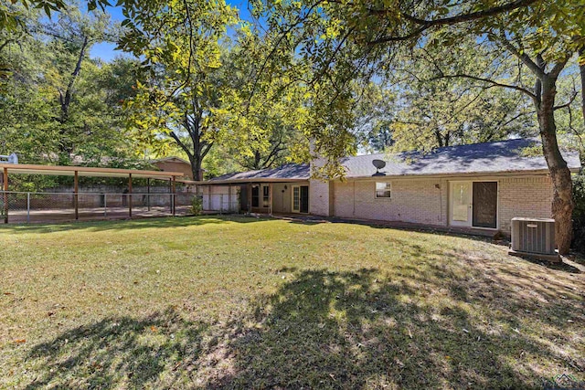 view of yard featuring central AC