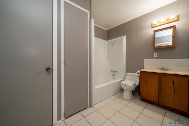 full bathroom featuring tile patterned floors, ornamental molding, vanity, bathing tub / shower combination, and toilet