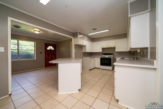 kitchen featuring white cabinetry, sink, white range, light tile patterned floors, and ornamental molding