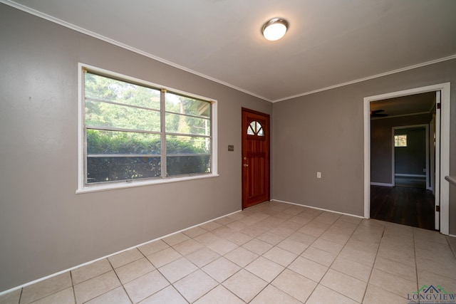 tiled entryway with crown molding