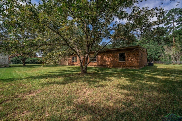 view of yard featuring central AC