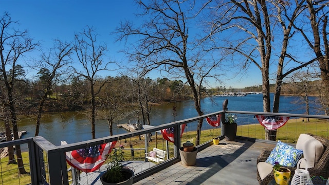 deck featuring a water view