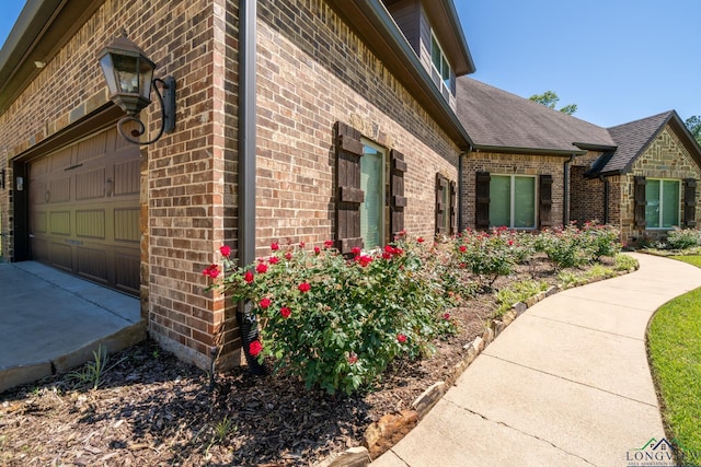 view of home's exterior with a garage