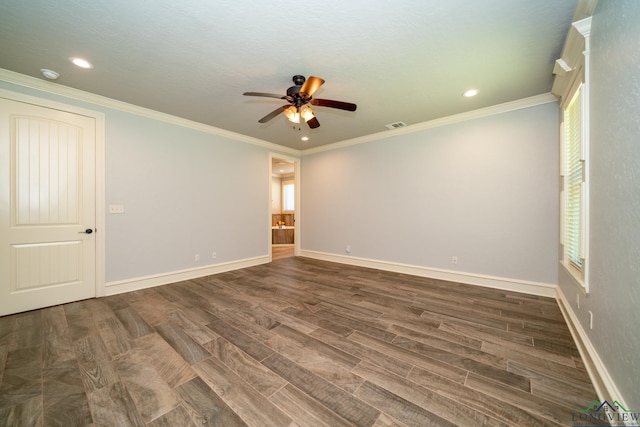 unfurnished room featuring dark wood-type flooring, ceiling fan, and ornamental molding