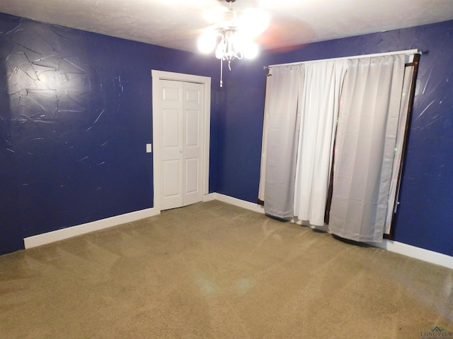 unfurnished bedroom featuring carpet floors