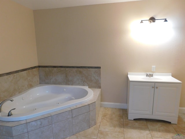 bathroom featuring vanity, tile patterned floors, and tiled tub