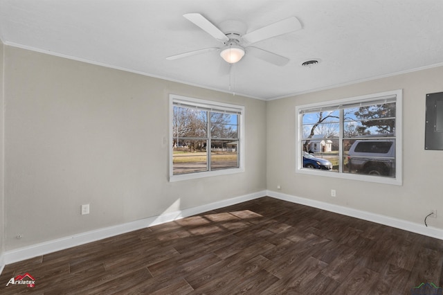 unfurnished room with ceiling fan, dark hardwood / wood-style floors, and ornamental molding