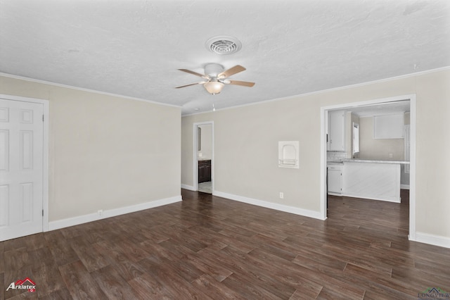 empty room featuring ceiling fan, dark hardwood / wood-style flooring, and crown molding