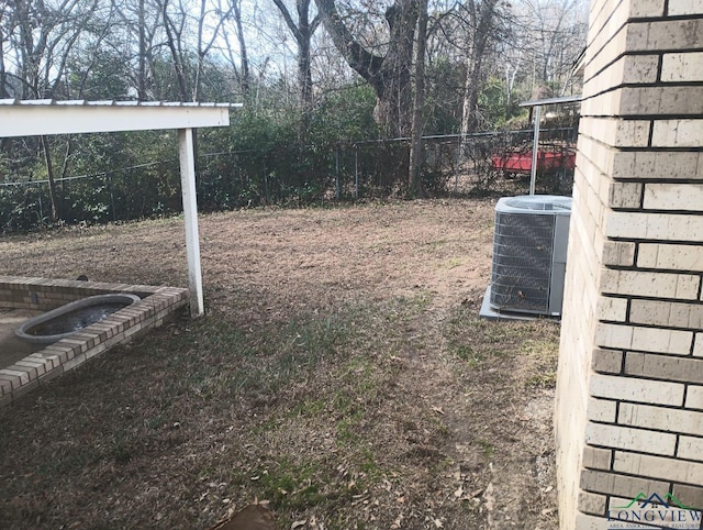 view of yard featuring central AC