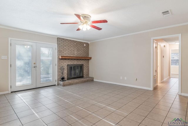 unfurnished living room with ornamental molding, light tile patterned floors, and plenty of natural light