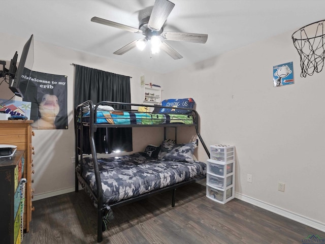 bedroom with ceiling fan and hardwood / wood-style floors