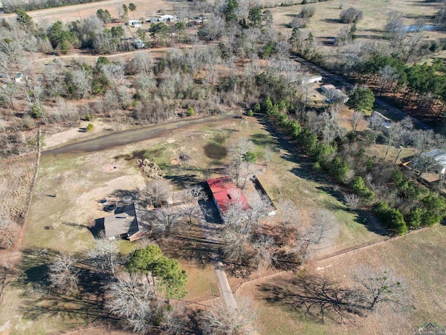 birds eye view of property with a rural view