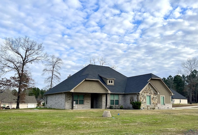 view of front of house with a front lawn