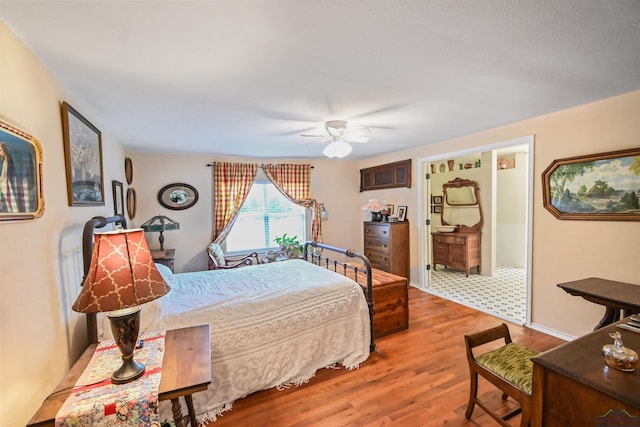 bedroom with ceiling fan and light hardwood / wood-style floors