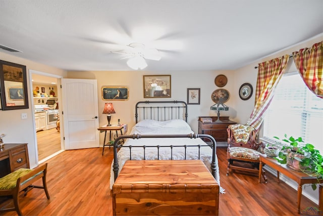 bedroom featuring ceiling fan and wood-type flooring