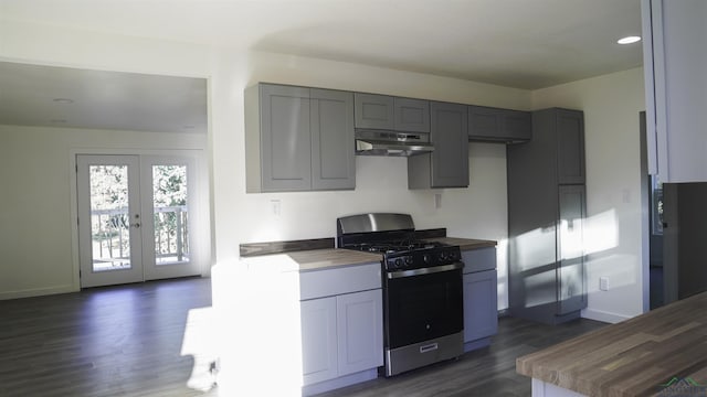 kitchen featuring gray cabinetry, french doors, butcher block countertops, dark hardwood / wood-style flooring, and stainless steel range with gas stovetop