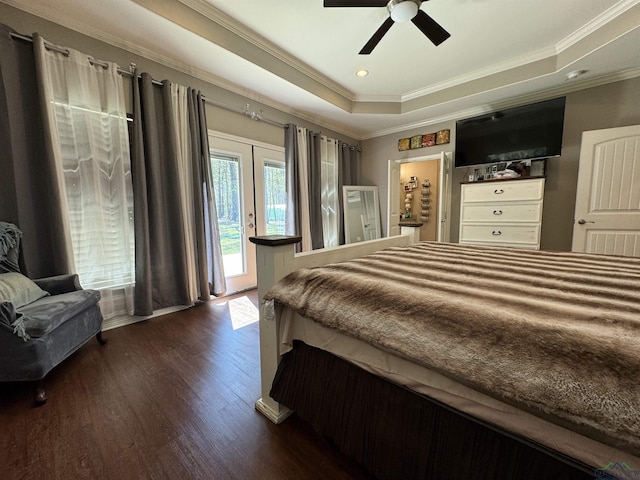 bedroom featuring ceiling fan, french doors, dark wood-type flooring, a raised ceiling, and access to outside