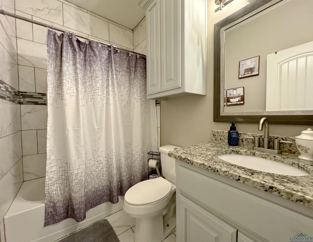 full bathroom with vanity, toilet, and shower / bath combo with shower curtain