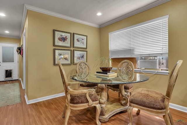 1303 Le Duke Blvd, Longview, TX 75601 - dining room featuring wood finished floors, crown molding, recessed lighting, and cooling unit