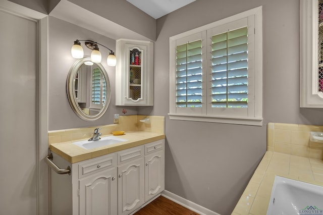 1303 Le Duke Blvd, Longview, TX 75601 - full bath with vanity and a tub