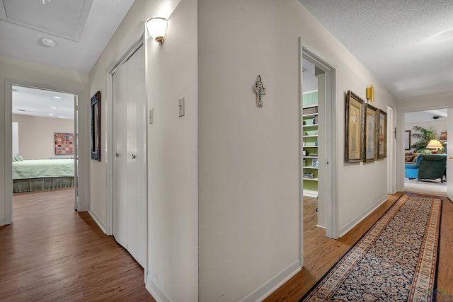 1303 Le Duke Blvd, Longview, TX 75601 - hall featuring wood finished floors and baseboards
