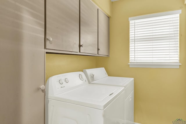 1303 Le Duke Blvd, Longview, TX 75601 - laundry area with separate washer and dryer and cabinet space