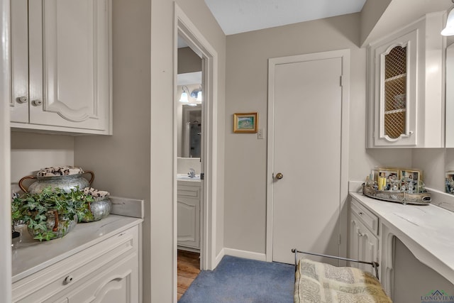 1303 Le Duke Blvd, Longview, TX 75601 - bar area featuring light wood finished floors and a sink