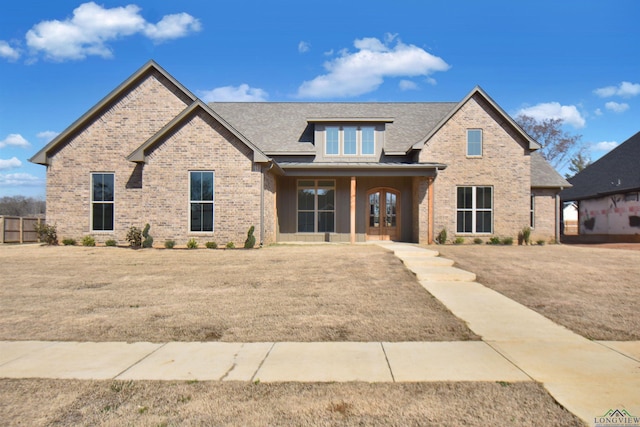 craftsman house featuring a front lawn