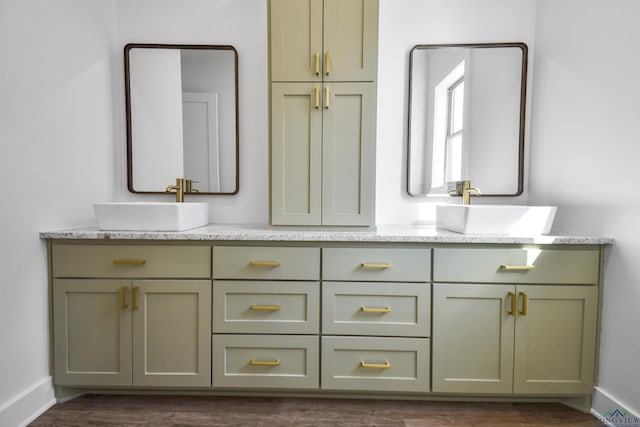 bathroom with vanity and hardwood / wood-style floors