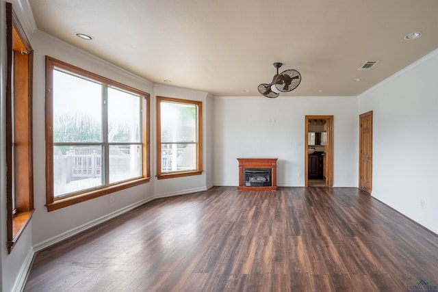 unfurnished living room with dark hardwood / wood-style floors and ornamental molding