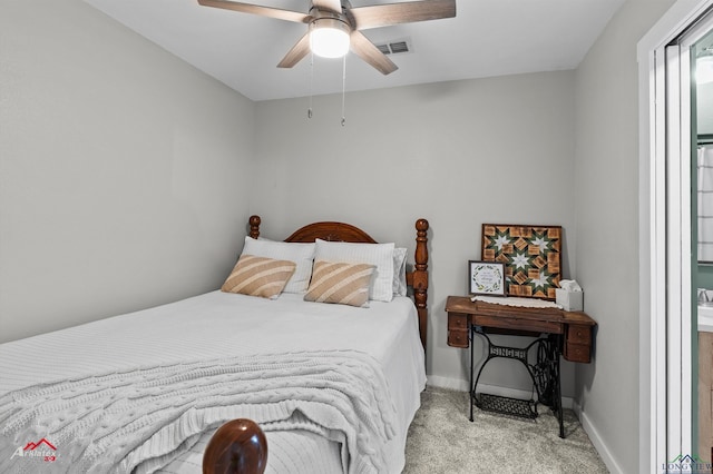 bedroom featuring light carpet, baseboards, a ceiling fan, and visible vents
