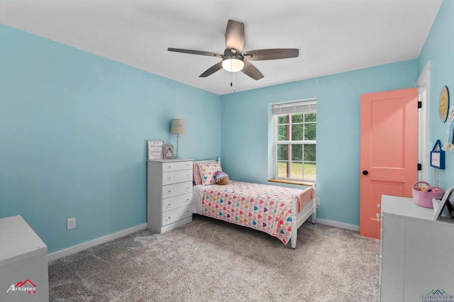 bedroom featuring baseboards, carpet flooring, and ceiling fan