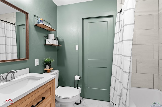 bathroom featuring shower / tub combo, toilet, marble finish floor, vanity, and a textured wall