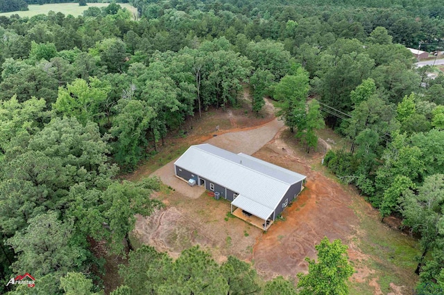 drone / aerial view with a view of trees