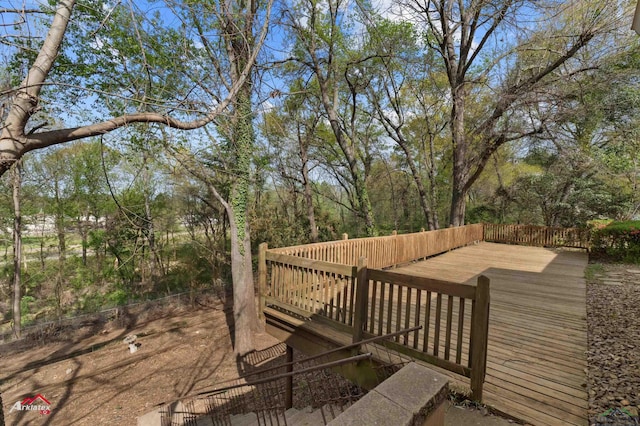 surrounding community with a wooden deck