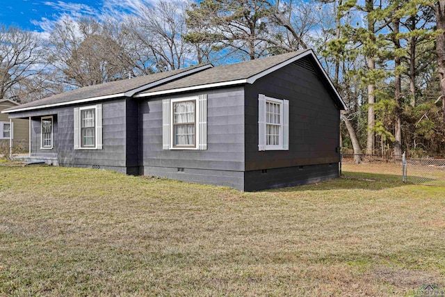 view of home's exterior featuring a yard