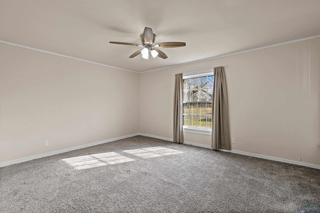 empty room with ornamental molding, carpet floors, and ceiling fan