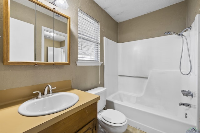 1324 Annette Dr, Longview, TX 75604 - bathroom with toilet, bathtub / shower combination, vanity, and a textured wall